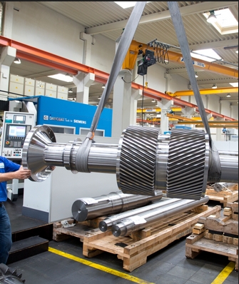 How do different gear materials impact the stress resistance of a gearbox under testing conditions?