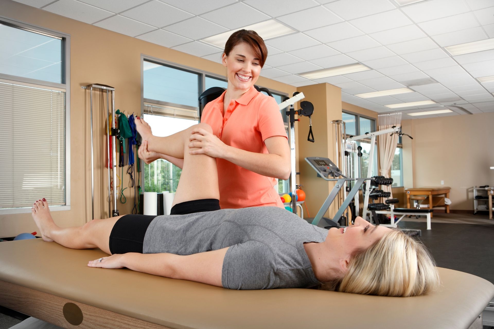 How does manual therapy help in reducing pain and improving range of motion in patients?