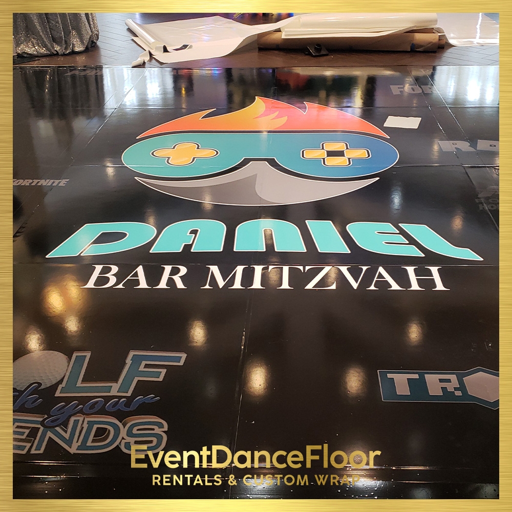 Are there specific design techniques that can enhance the visual appeal of inlaid dance floors?